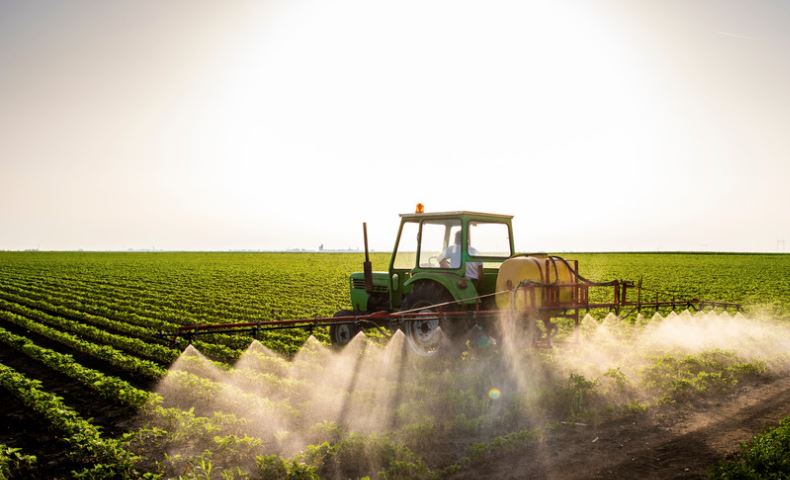 tractor with pesticides